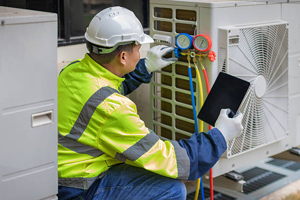 Professional Heat Pump Repair technician working in Auburn, IL